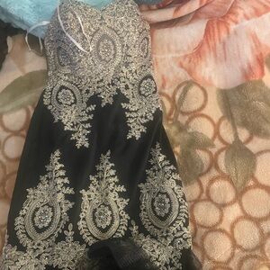 Elegant Black and gold evening gown , prom
Dress